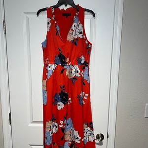 Orange high low dress with flowers. BONUS - it has pockets!!